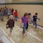 Kids walking through the mural Kids walking through the mural