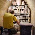 John Rezner loading work for first firing John Rezner loading work for first firing