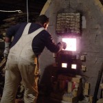 Wade Oliver stoking during the first firing Wade Oliver stoking during the first firing