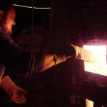 Wade Oliver stoking during the first firing Wade Oliver stoking during the first firing