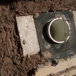 adding a thick layer of clay insulation over kiln